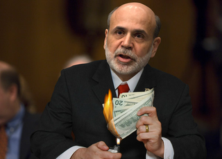 Calling it "basically no more than five rectangular strips of paper," Fed chairman Ben Bernanke illustrates how much "$200" is actually worth.
